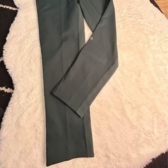 Lululemon woman’s pants. Teal in colour. New condition. Size 6. Pockets. Stretch - Picture 10 of 11